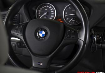 Подержанный автомобиль BMW X5 2010 года (13 фото)