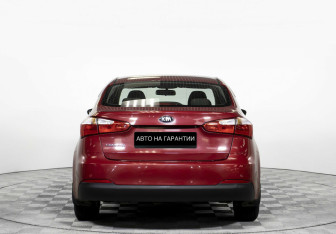Подержанный автомобиль Kia Cerato Sedan 2013 года (6 фото)