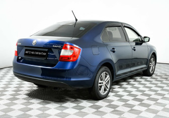 Подержанный автомобиль Skoda Rapid Liftback 2014 года (3 фото)