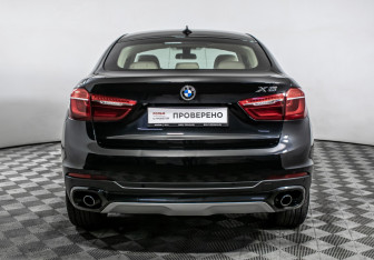 Подержанный автомобиль BMW X6 2016 года (6 фото)