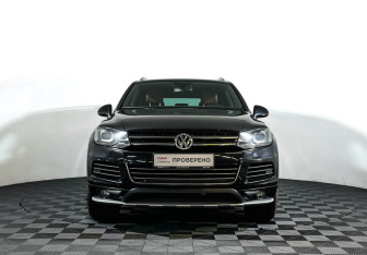 Подержанный автомобиль Volkswagen Touareg 2014 года (2 фото)