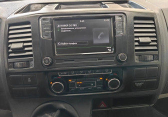 Подержанный автомобиль Volkswagen Caravelle 2014 года (13 фото)
