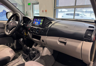 Подержанный автомобиль Mitsubishi L200 2007 года (13 фото)