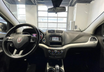 Подержанный автомобиль Fiat Freemont 2013 года (10 фото)