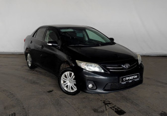 Подержанный автомобиль Toyota Corolla Sedan 2010 года (3 фото)