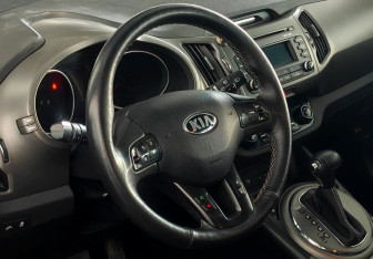 Подержанный автомобиль Kia Sportage 2014 года (12 фото)