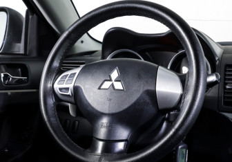 Подержанный автомобиль Mitsubishi Lancer Sedan 2008 года (13 фото)