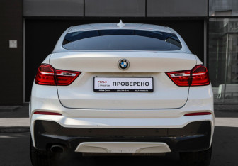 Подержанный автомобиль BMW X4 2015 года (6 фото)