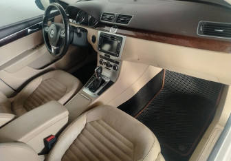 Подержанный автомобиль Volkswagen Passat Sedan 2011 года (10 фото)