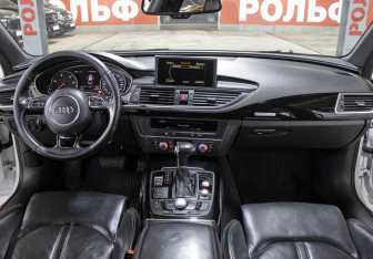 Подержанный автомобиль Audi A7 2014 года (14 фото)
