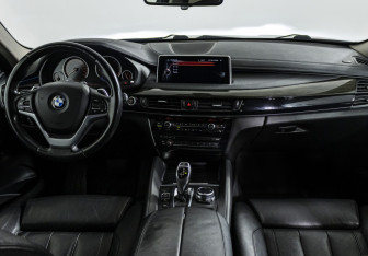 Подержанный автомобиль BMW X6 2016 года (14 фото)