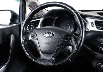 Подержанный автомобиль Kia Ceed Wagon 2014 года (14 фото)