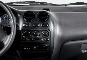 Подержанный автомобиль Daewoo Matiz 2012 года (15 фото)