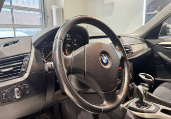 Подержанный автомобиль BMW X1 2013 года (9 фото)