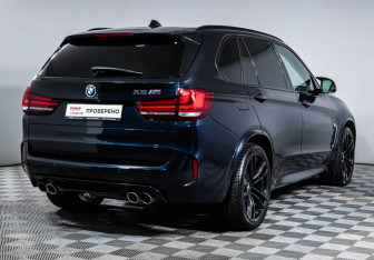Подержанный автомобиль BMW X5 M 2015 года (5 фото)