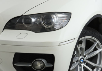 Подержанный автомобиль BMW X6 2012 года (22 фото)