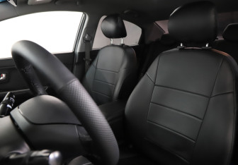 Подержанный автомобиль Kia Rio Sedan 2015 года (15 фото)