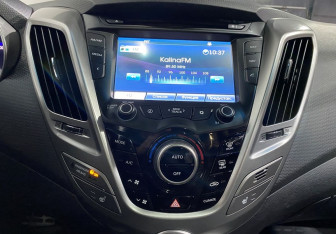 Подержанный автомобиль Hyundai Veloster 2013 года (13 фото)