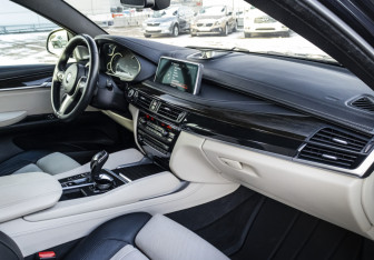 Подержанный автомобиль BMW X6 2015 года (11 фото)