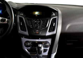Подержанный автомобиль Ford Focus Sedan 2014 года (11 фото)