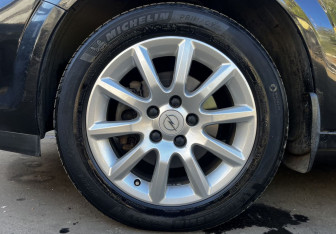 Подержанный автомобиль Opel Astra Sedan 2014 года (9 фото)