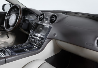 Подержанный автомобиль Jaguar XJ 2013 года (9 фото)