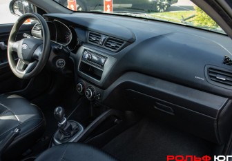 Подержанный автомобиль Kia Rio Sedan 2012 года (7 фото)