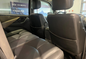 Подержанный автомобиль Mazda Tribute 2003 года (11 фото)