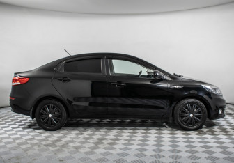 Подержанный автомобиль Kia Rio Sedan 2015 года (4 фото)