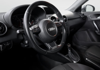 Подержанный автомобиль Audi A1 2014 года (14 фото)