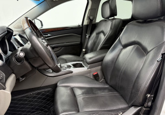Подержанный автомобиль Cadillac SRX 2010 года (10 фото)