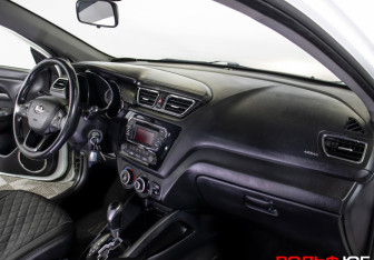 Подержанный автомобиль Kia Rio Sedan 2013 года (9 фото)