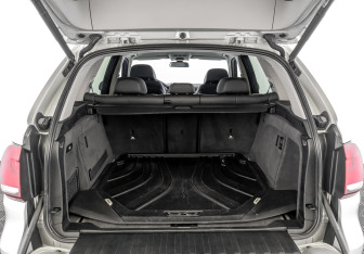 Подержанный автомобиль BMW X5 2015 года (10 фото)