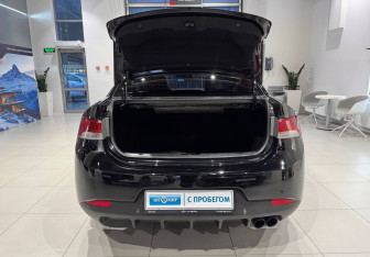 Подержанный автомобиль Kia Cerato Coupe 2010 года (6 фото)