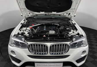 Подержанный автомобиль BMW X4 2016 года (10 фото)