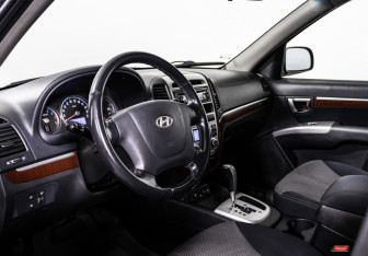 Подержанный автомобиль Hyundai Santa Fe 2006 года (12 фото)