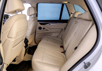 Подержанный автомобиль BMW X5 2014 года (12 фото)