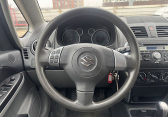 Подержанный автомобиль Suzuki SX4 Hatchback 2012 года (13 фото)