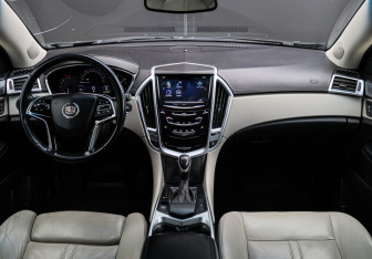 Подержанный автомобиль Cadillac SRX 2014 года (9 фото)