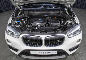 Подержанный автомобиль BMW X1 2015 года (9 фото)