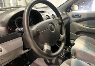 Подержанный автомобиль Chevrolet Lacetti Hatchback 2009 года (13 фото)