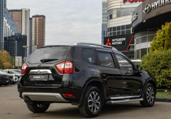 Подержанный автомобиль Nissan Terrano 2014 года (4 фото)