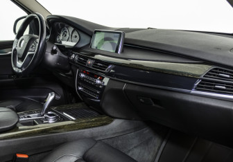 Подержанный автомобиль BMW X5 2014 года (9 фото)