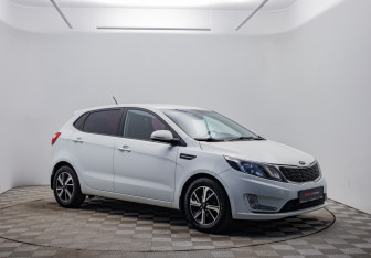 Подержанный автомобиль Kia Rio Hatchback 2013 года (3 фото)